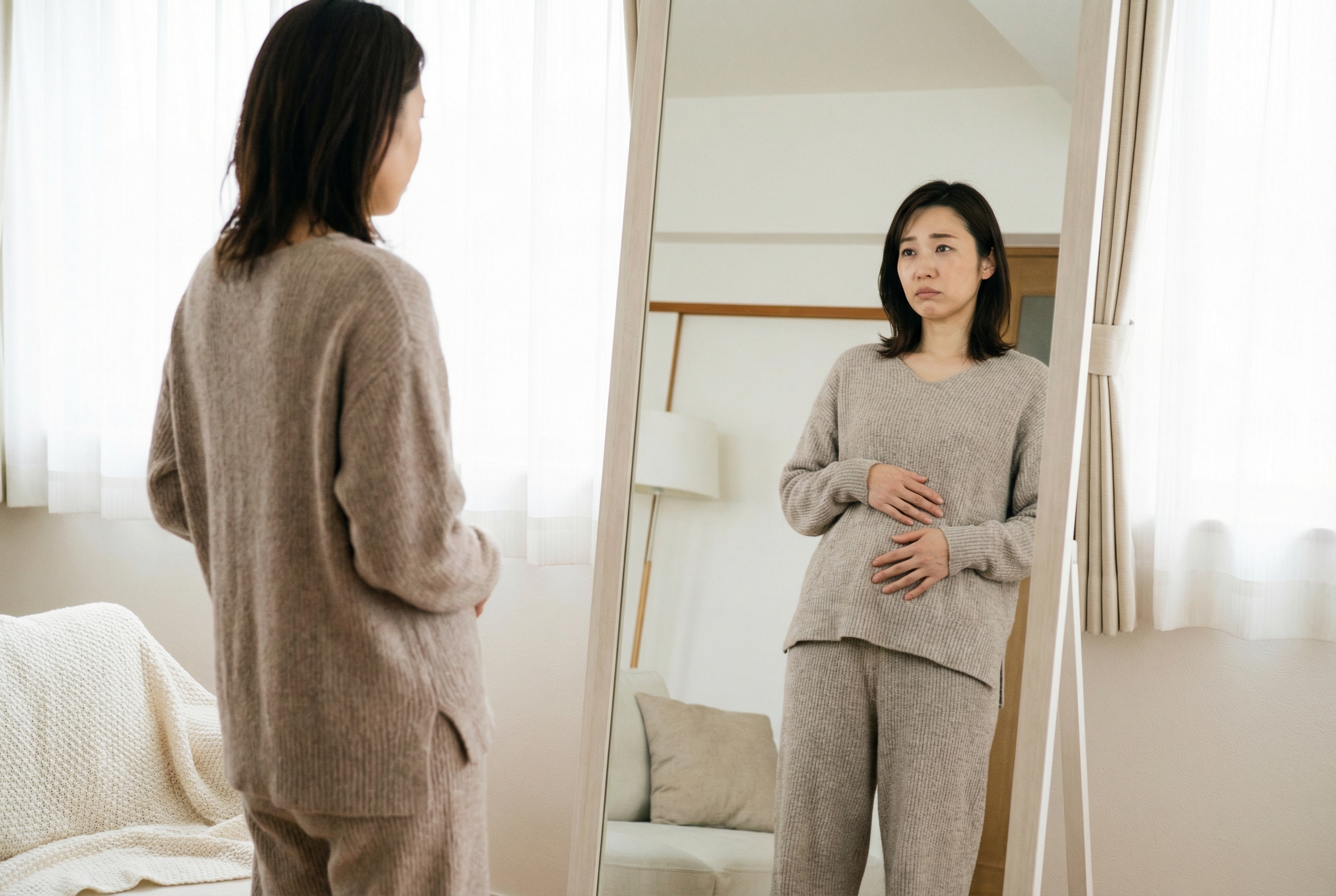 悩んでいる女性